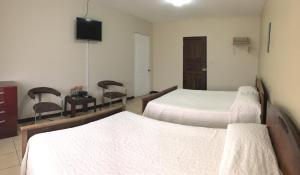 圣玛丽亚旅馆客房内的一张或多张床位