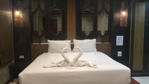 吉吉别墅酒店客房内的一张或多张床位