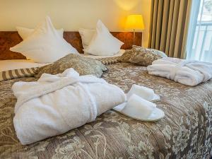 格拉塔森特姆酒店客房内的一张或多张床位