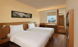 ibis Coimbatore City Centre - An Accor Brand客房内的一张或多张床位