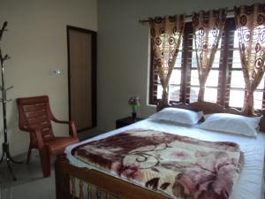 Karan Home Stay客房内的一张或多张床位