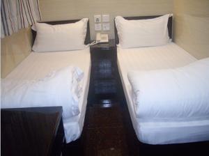 CANADIAN Hostel客房内的一张或多张床位