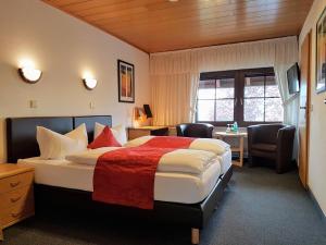 祖波斯特兰德豪斯酒店客房内的一张或多张床位