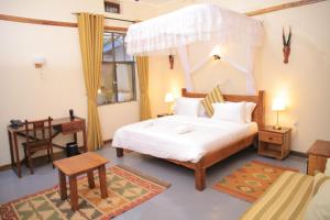 Kampala Forest Resort - KFR Lodge客房内的一张或多张床位