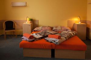 卡丹瑞科公寓式酒店客房内的一张或多张床位