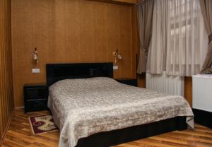 Hotel Obola客房内的一张或多张床位