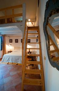 马塞里亚齐萨摩尔乡村民宿客房内的一张或多张双层床