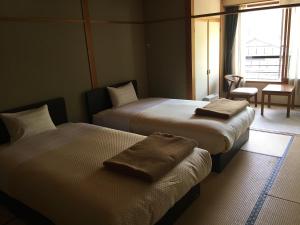 黑拉尤诺莫利酒店客房内的一张或多张床位