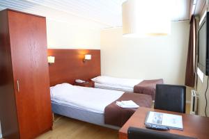 克拉加酒店客房内的一张或多张床位