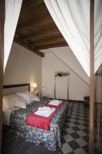 Le Spezie dei Florio客房内的一张或多张床位
