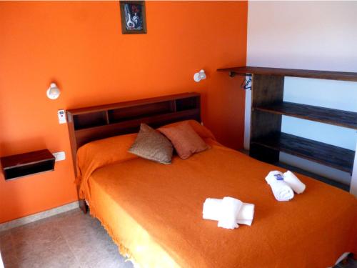 Apartamentos Barranca de Termas客房内的一张或多张床位