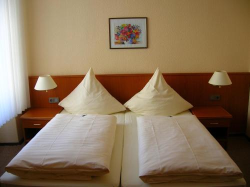 Hotel "Stadt Köthen"客房内的一张或多张床位