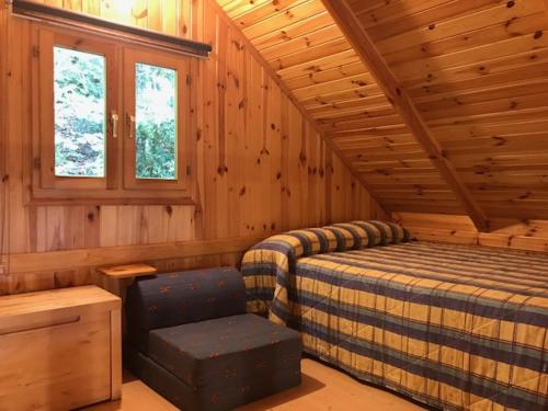 Camping Aneto客房内的一张或多张床位