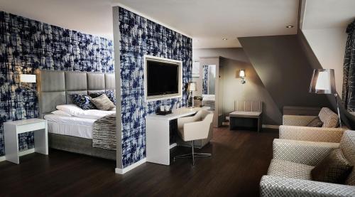 Bergstadens Hotel og SPA客房内的一张或多张床位
