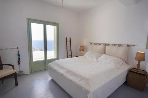 Patmos Exclusive Villas客房内的一张或多张床位