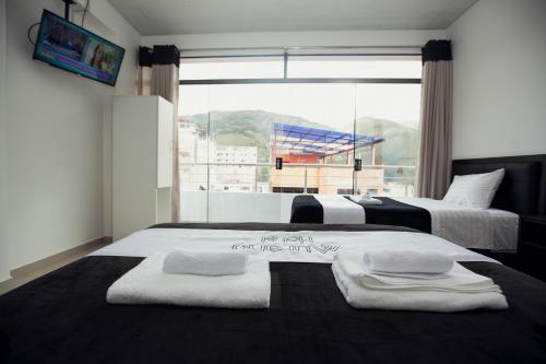 Hotel Murano客房内的一张或多张床位