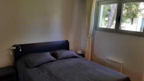 Green Cap d'Antibes客房内的一张或多张床位