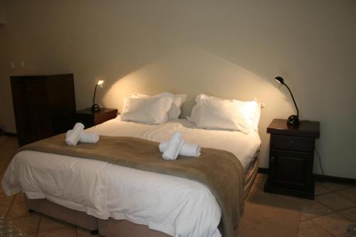 De Vagebond Hotel-Pension客房内的一张或多张床位