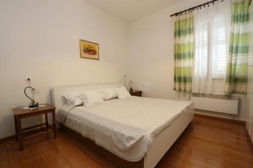 Apartment Pijer客房内的一张或多张床位