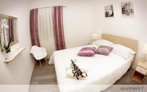 Apartmani Murtilica客房内的一张或多张床位