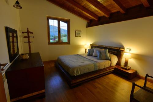 Casa Rural Amazonas客房内的一张或多张床位