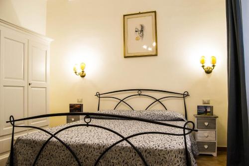 波波罗多姆斯广场住宿加早餐旅馆客房内的一张或多张床位