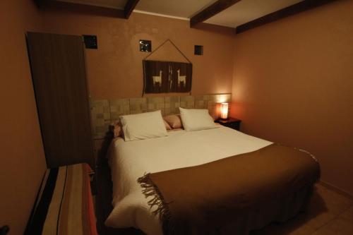 Hostal Casa Turipite客房内的一张或多张床位