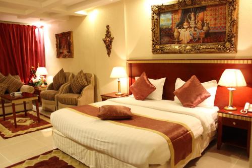 Abha Crown Hotel客房内的一张或多张床位