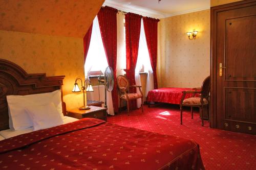 萨尔玛塔塞斯波尔多斯基酒店客房内的一张或多张床位