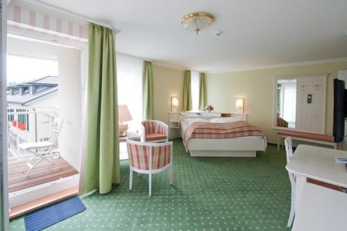 阿尔特兰德库格及酒店客房内的一张或多张床位