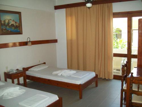 卡多斯塔罗斯海滩公寓客房内的一张或多张床位