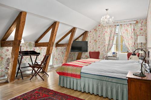淘福豪姆海尔戈尔德酒店客房内的一张或多张床位