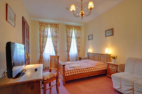 马格尼斯酒店客房内的一张或多张床位