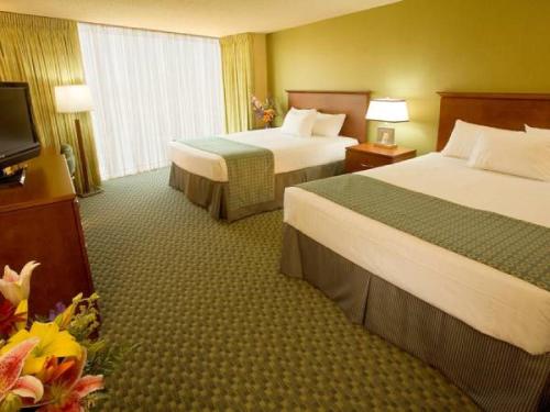 水瓶座赌场度假酒店客房内的一张或多张床位
