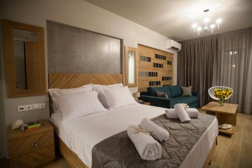 Pallas Luxury Apartments客房内的一张或多张床位