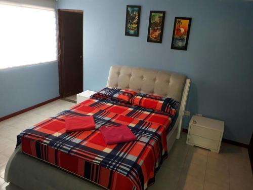 Apartamento Perla del Caribe客房内的一张或多张床位
