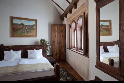 哈拉斯王子佩泽欧酒店客房内的一张或多张床位