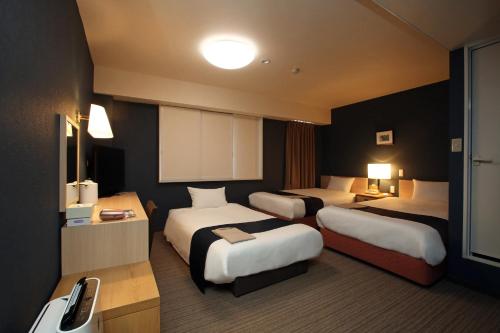 高山田园酒店客房内的一张或多张床位