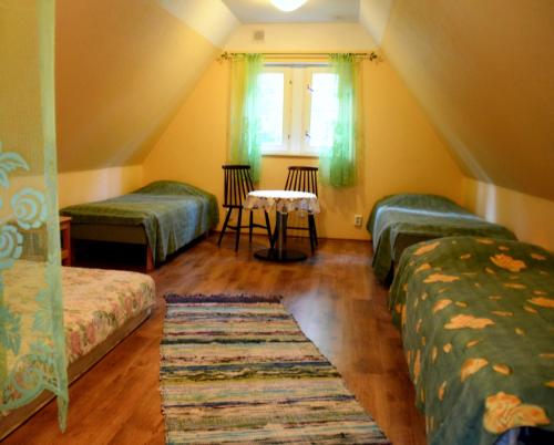 Roosi Camping Houses客房内的一张或多张床位