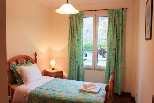 Vista Formosa Funchal客房内的一张或多张床位