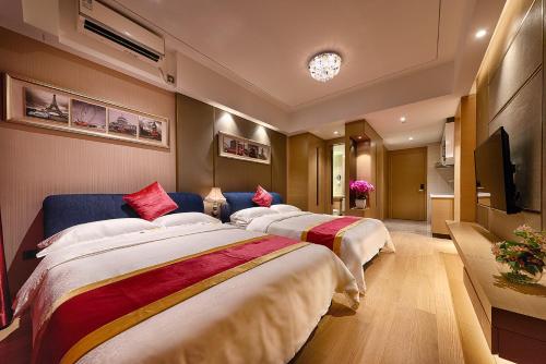 喜运酒店公寓（广州杨箕富力新天地店）客房内的一张或多张床位