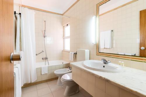 皮尼亚尔码头旅游公寓酒店的一间浴室