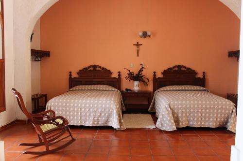 Hotel Posada Doña Lala客房内的一张或多张床位