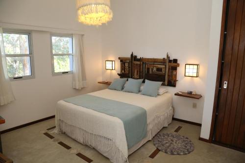 Alma de La Pedrera - Villaggio & Spa客房内的一张或多张床位