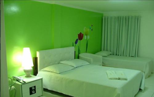 Hotel Porthal da Ilha- Paulo Afonso-Ba客房内的一张或多张床位