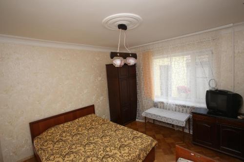 Apartment Na Parkovoy客房内的一张或多张床位