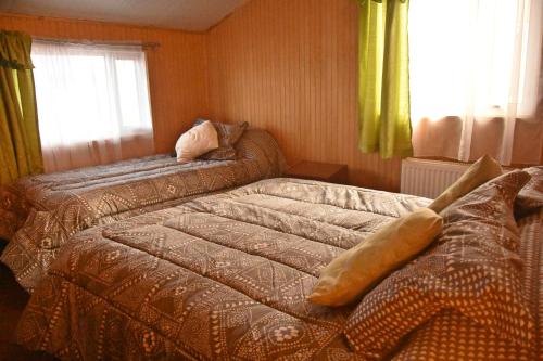 卡瓦尼亚斯巴塔哥尼亚英斯图公寓客房内的一张或多张床位