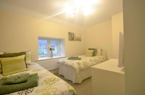 Rural Coastal Self-Catering Accommodation for 8, Near Sandringham Estate, Norfolk客房内的一张或多张床位