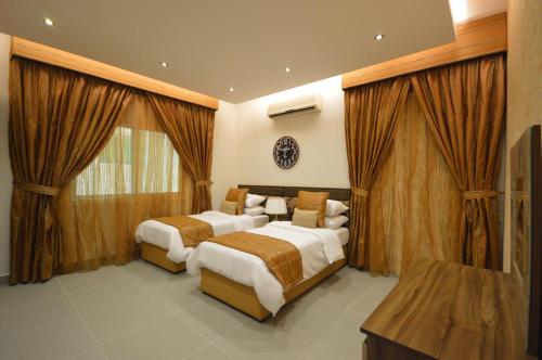 رحال البحر للشقق المخدومة Rahhal AlBahr Serviced Apartments客房内的一张或多张床位