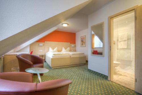 斯托尔贝格酒店客房内的一张或多张床位
